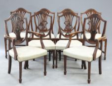 A SET OF EIGHT HEPPLEWHITE STYLE MAHOGANY DINING CHAIRS