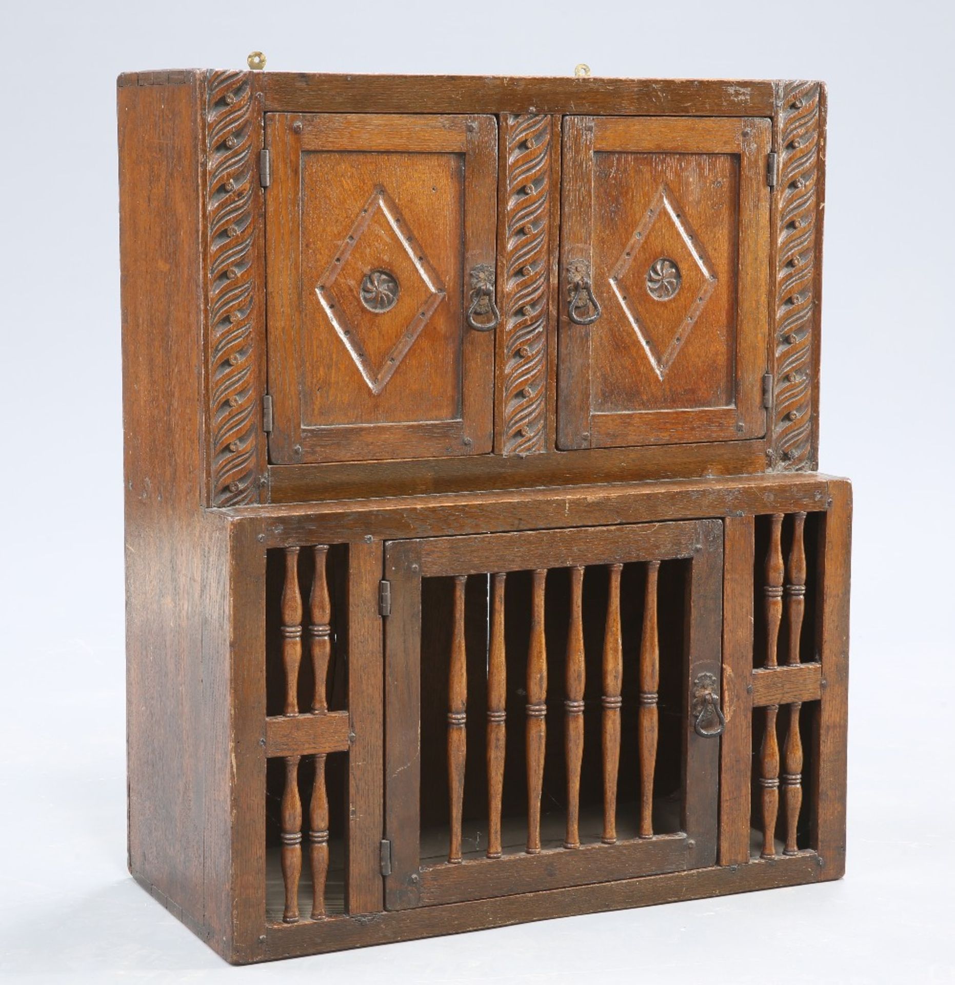 A VICTORIAN CARVED OAK FOOD HUTCH