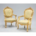 A PAIR LOUIS XV STYLE GILDED AND UPHOLSTERED FAUTEUILS