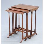 A SET OF THREE EDWARDIAN SATINWOOD BANDED MAHOGANY SPIDER LEG NESTING TABLES