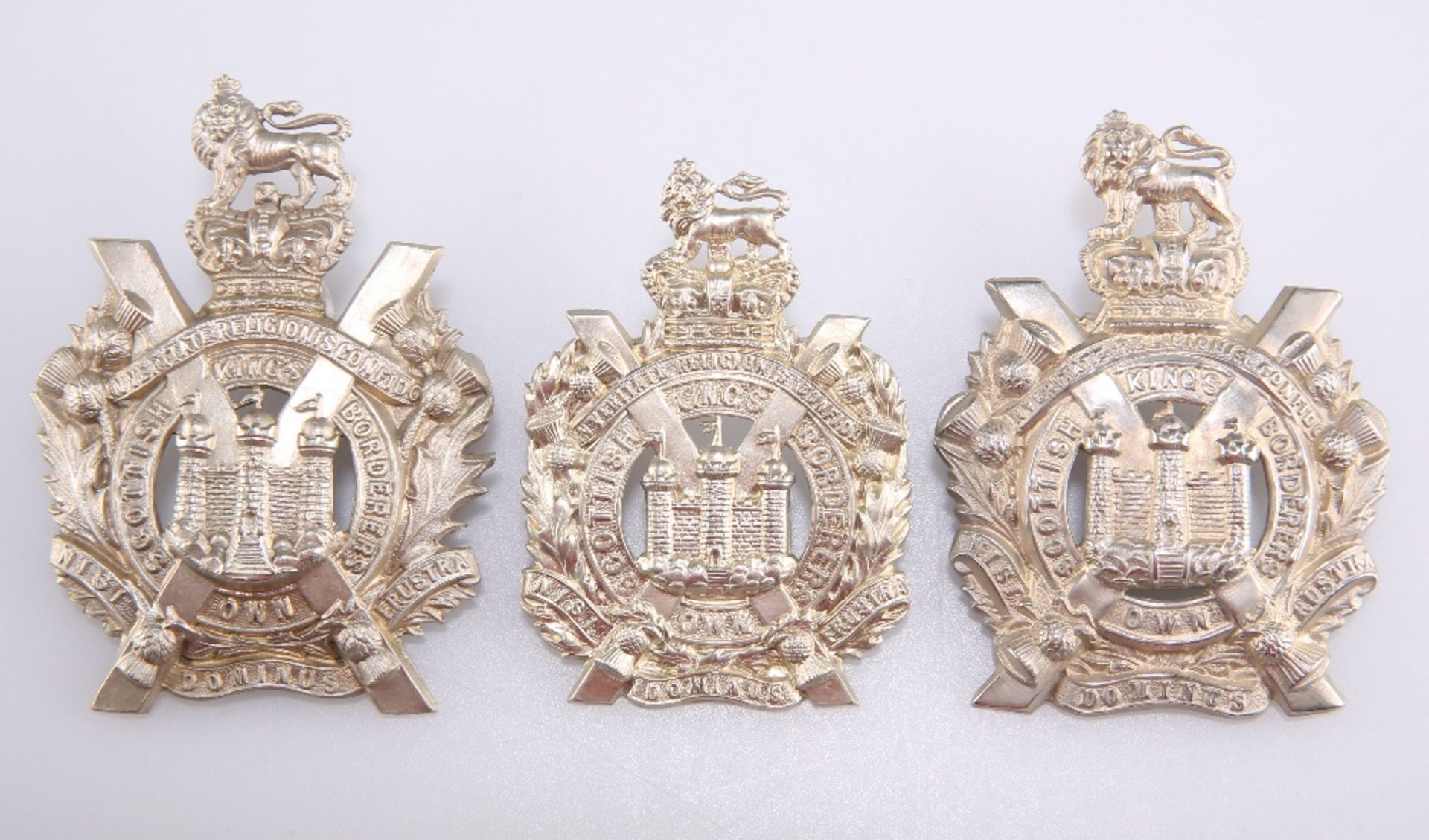 THREE EXAMPLES OF THE PRE 1902 OTHER RANKS' PATTERN GLENGARRY BADGE KOSB