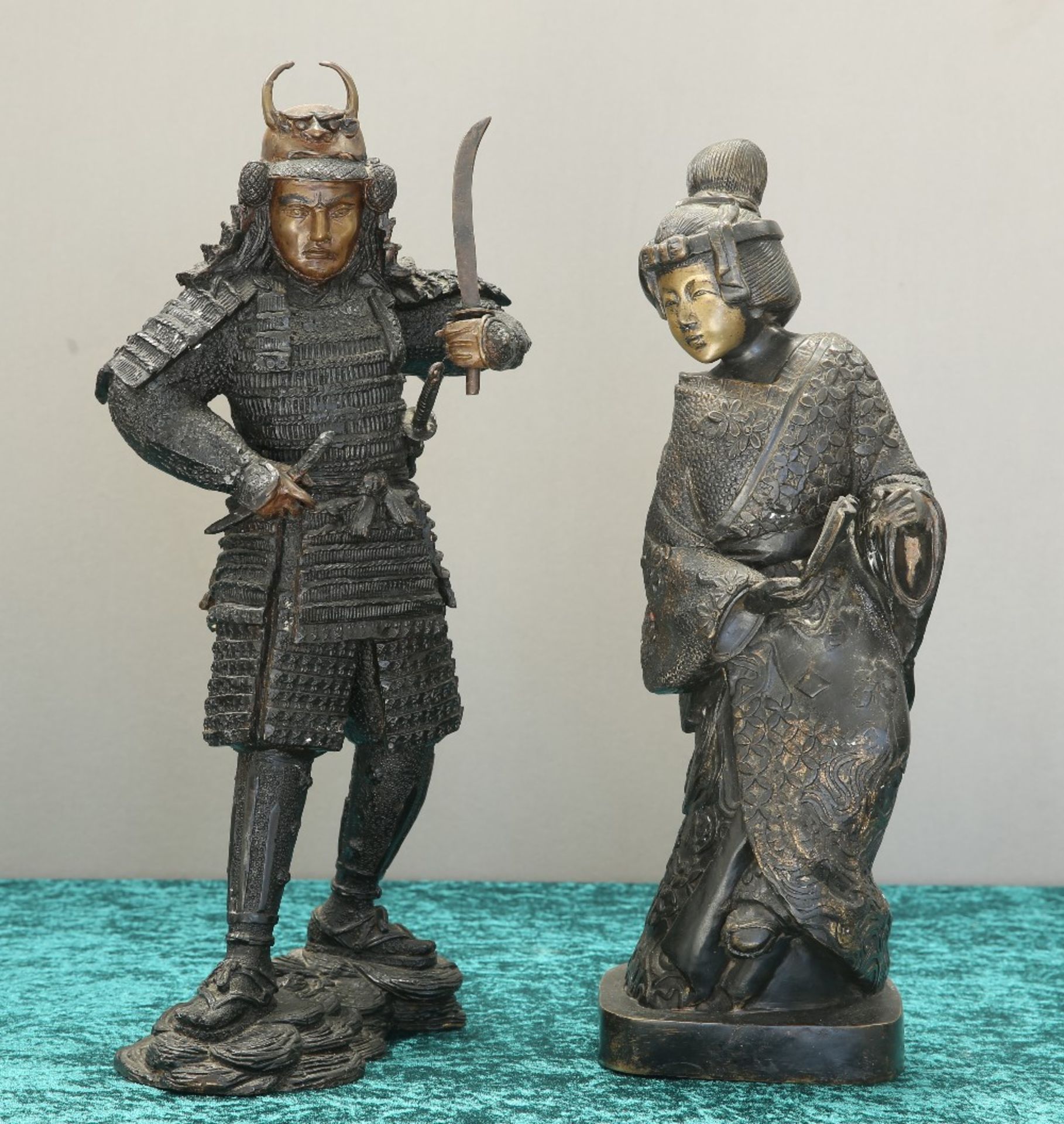 A JAPANESE BRONZE FIGURE OF A SAMURAI