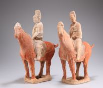 TWO CHINESE POTTERY HORSES AND RIDERS