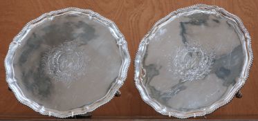 A LARGE PAIR OF GEORGE III SILVER SALVERS