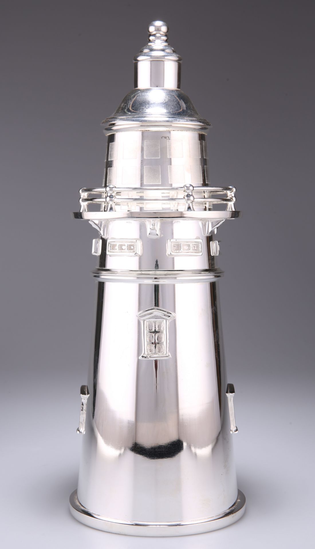 A LARGE SILVER-PLATED NOVELTY COCKTAIL SHAKER