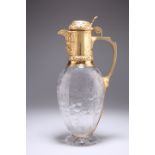 A VICTORIAN SILVER-GILT MOUNTED CUT-GLASS CLARET JUG