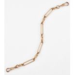 A 9CT ROSE GOLD LONG AND SHORT LINK BRACELET