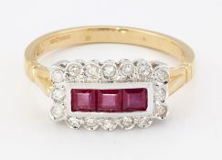 AN 18CT GOLD RUBY AND DIAMOND CLUSTER RING