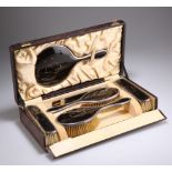 A GEORGE V SILVER-MOUNTED TORTOISESHELL DRESSING TABLE SET