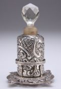 AN EDWARDIAN SILVER-MOUNTED SCENT BOTTLE