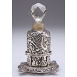 AN EDWARDIAN SILVER-MOUNTED SCENT BOTTLE