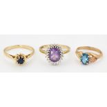 THREE GOLD GEM-SET RINGS