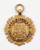 A 9CT GOLD CRICKET MEDALLION