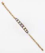 A LATE VICTORIAN OPAL AND DIAMOND BRACELET