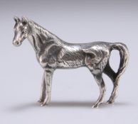 A CAST SILVER MODEL OF A HORSE