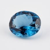 A LOOSE OVAL-CUT BLUE TOPAZ, 36.64 CARAT