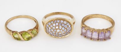 THREE 9CT GOLD GEM-SET RINGS