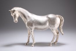 AN ELIZABETH II CAST SILVER MODEL OF A HORSE