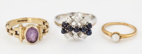 THREE GEM-SET RINGS