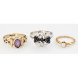 THREE GEM-SET RINGS