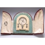 AN EARLY 20TH CENTURY FRENCH DIAMOND-SET IVORY STRUT CLOCK