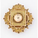 A VICTORIAN ETRUSCAN REVIVAL BROOCH