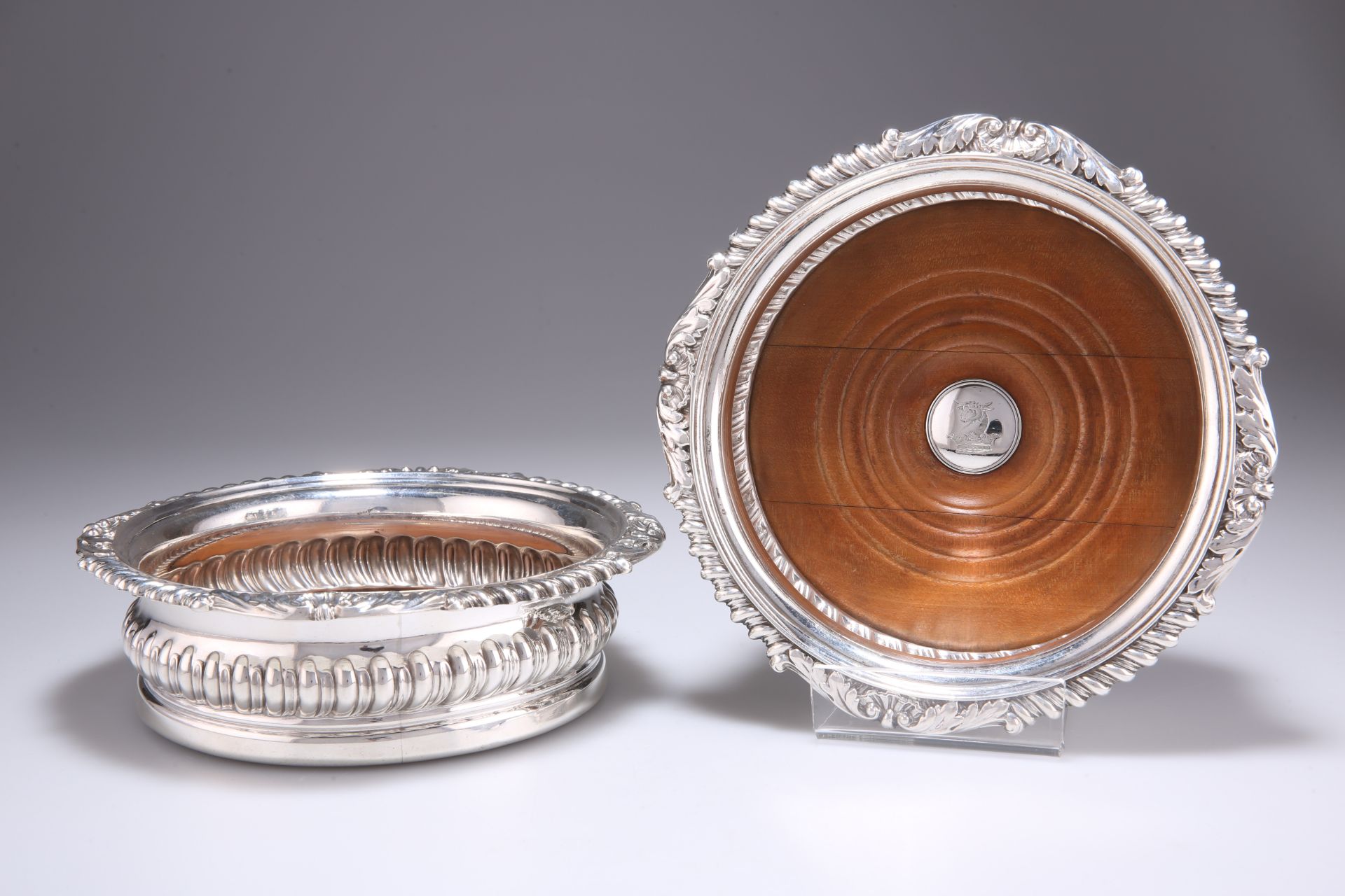 A PAIR OF GEORGE IV SILVER WINE COASTERS