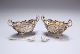 A PAIR OF ART NOUVEAU SILVER SALTS