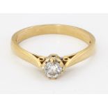 AN 18CT GOLD SOLITAIRE DIAMOND RING