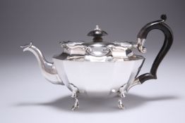 AN EDWARDIAN SILVER TEAPOT