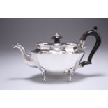 AN EDWARDIAN SILVER TEAPOT