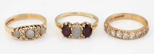 THREE 9CT GOLD GEM-SET RINGS