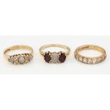 THREE 9CT GOLD GEM-SET RINGS