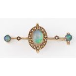 A LATE VICTORIAN BLACK OPAL AND SEED PEARL BROOCH