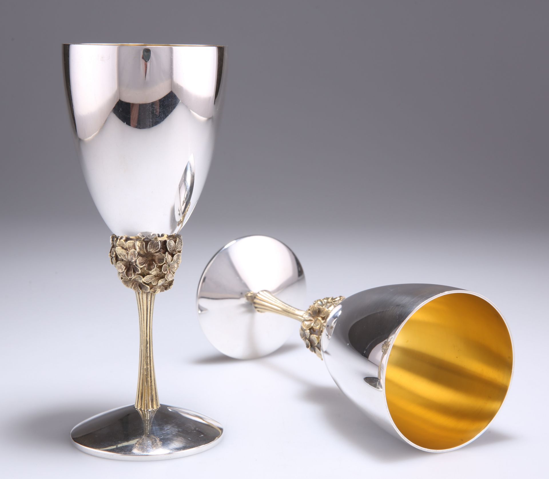 A PAIR OF ELIZABETH II PARCEL-GILT SILVER GOBLETS - Image 2 of 3