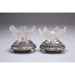 A PAIR OF GERMAN SILVER AND CUT-GLASS SALTS