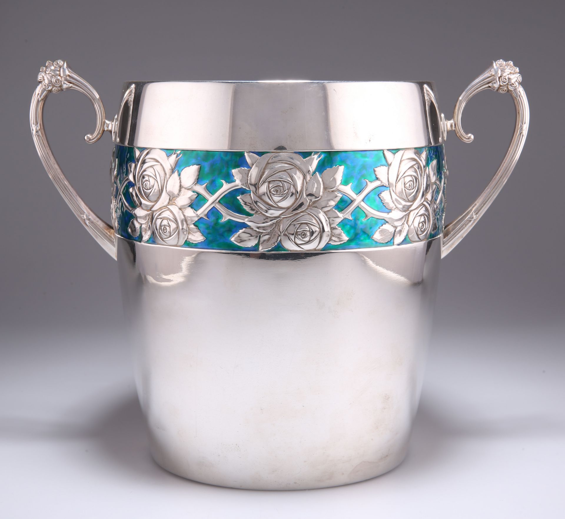 A LARGE GERMAN ART NOUVEAU SILVER-PLATED AND ENAMEL ICE BUCKET