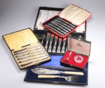 A GROUP OF BOXED SILVER AND PLATED FLATWARE AND SERVING PIECES