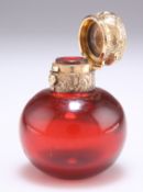 A VICTORIAN GOLD-MOUNTED RUBY GLASS SCENT BOTTLE