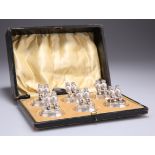 A SET OF SIX EDWARDIAN SILVER NOVELTY MENU HOLDERS