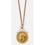 A 1911 GEORGE V HALF SOVEREIGN SOLDERED AS A PENDANT