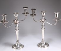 A PAIR OF GEORGE III SILVER AND OLD SHEFFIELD PLATE THREE-LIGHT CANDELABRA