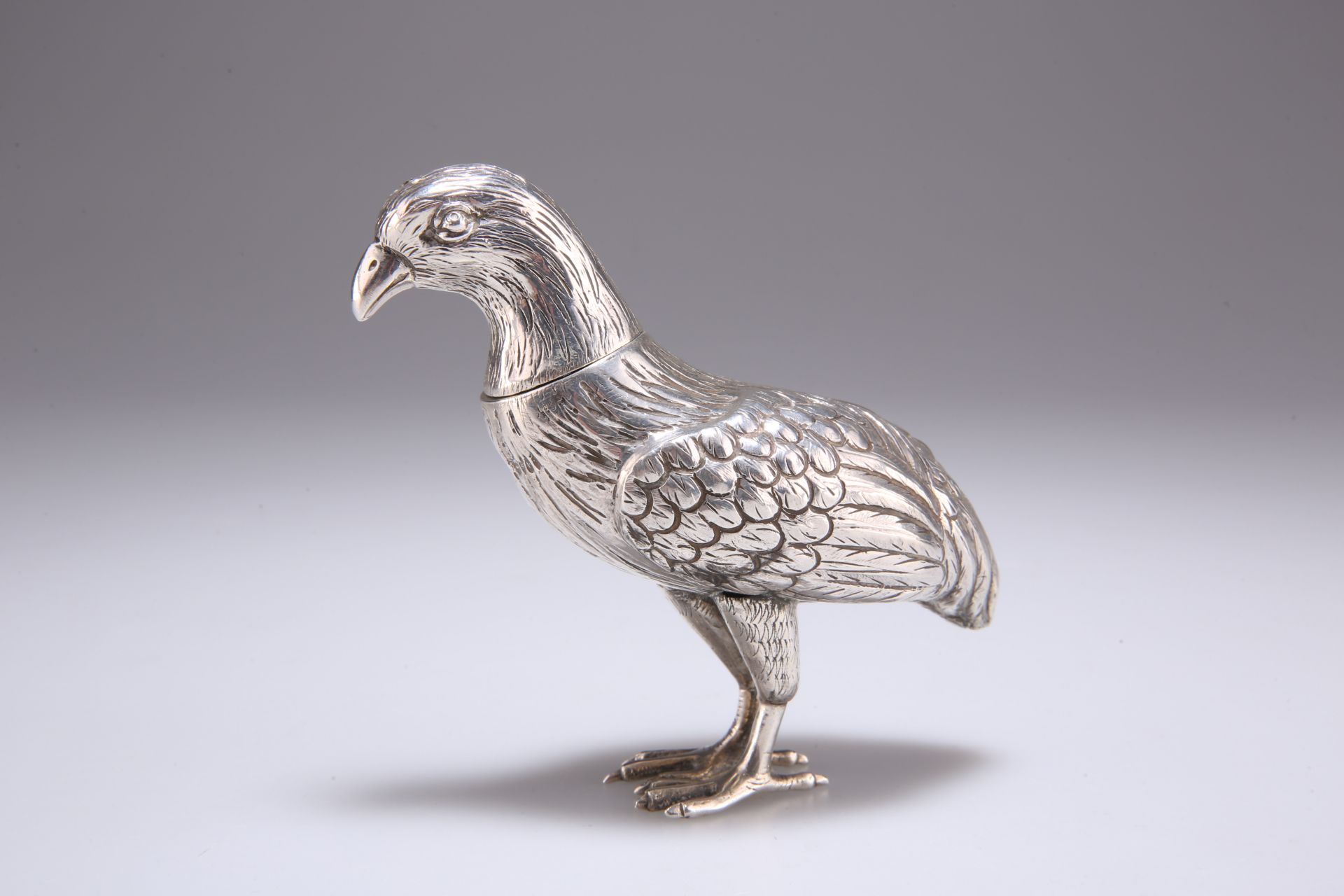 A 19TH CENTURY CONTINENTAL SILVER NOVELTY PEPPER POT