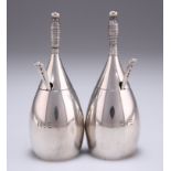 A PAIR OF GEORGE V SILVER NOVELTY MUSTARD POTS