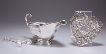 A SILVER SAUCEBOAT, HEART-SHAPED DISH AND SUGAR TONGS