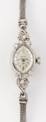 A LADY'S 14 CARAT WHITE GOLD BULOVA BRACELET WATCH