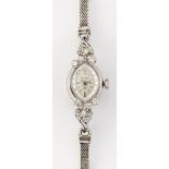 A LADY'S 14 CARAT WHITE GOLD BULOVA BRACELET WATCH