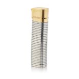A BULGARI 'TUBOGAS' STAINLESS STEEL AND SILVER-GILT LIGHTER
