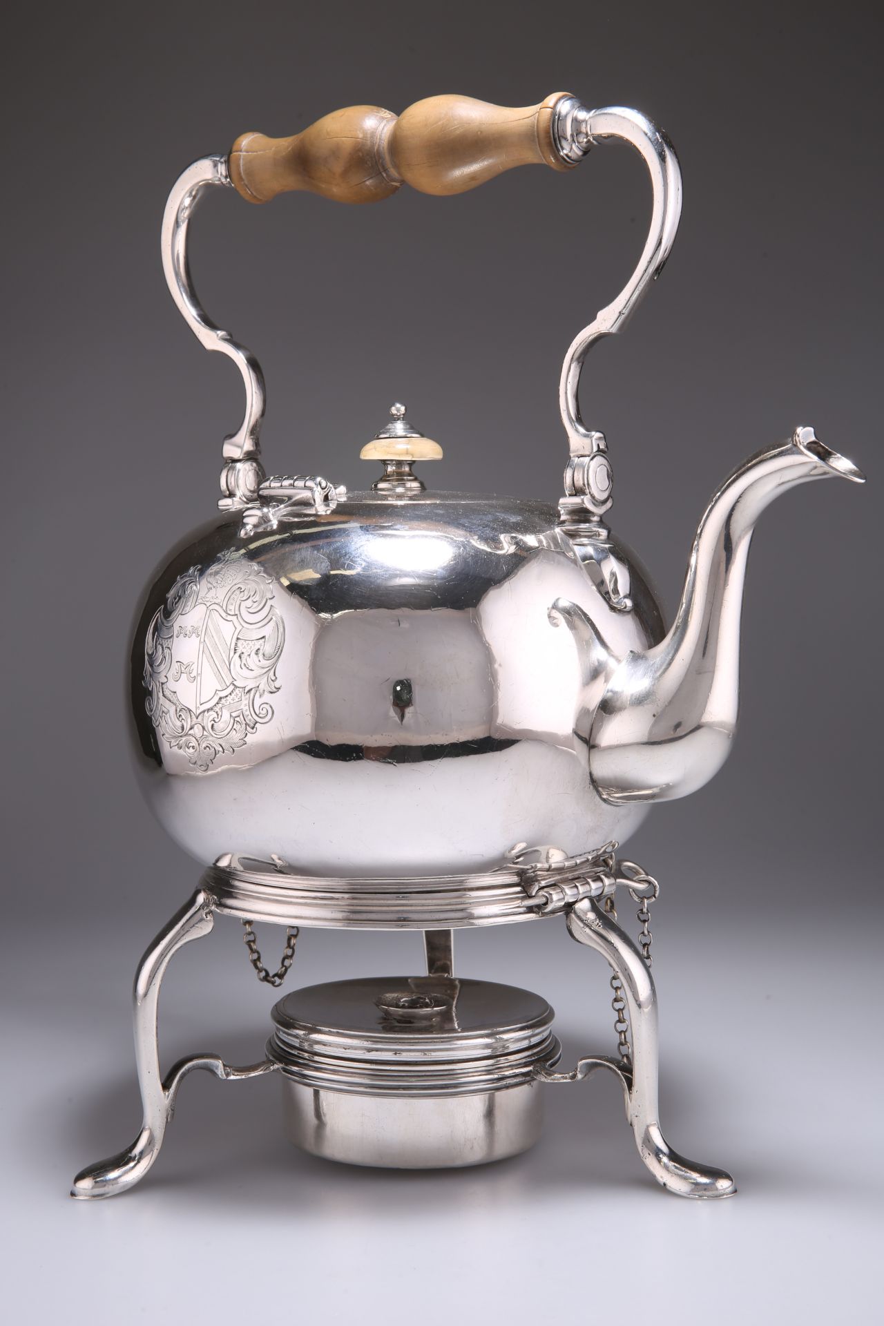 A GEORGE I SILVER KETTLE ON STAND