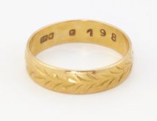 A GOLD BAND RING